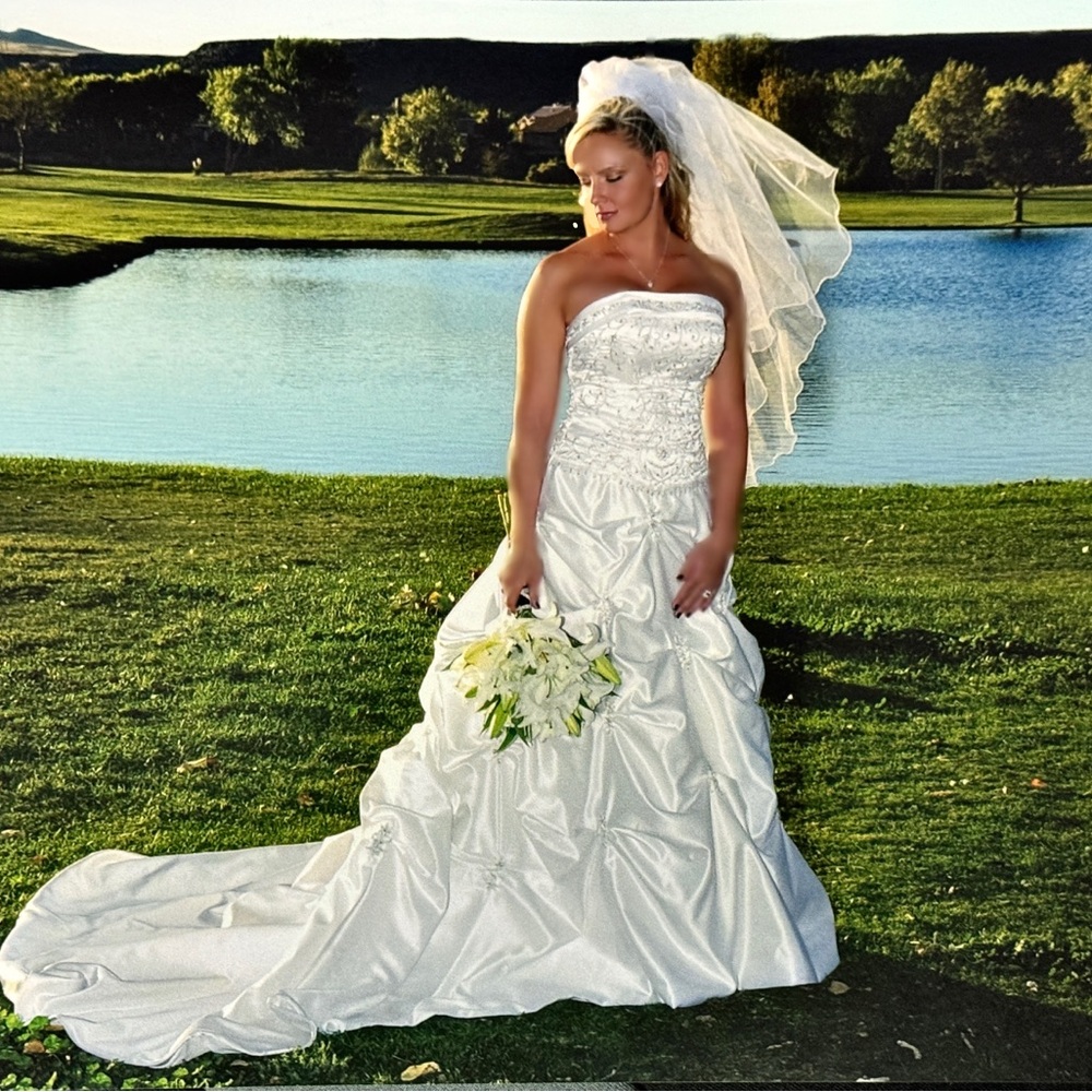 Feel like a Princess in this Classic White Wedding Gown